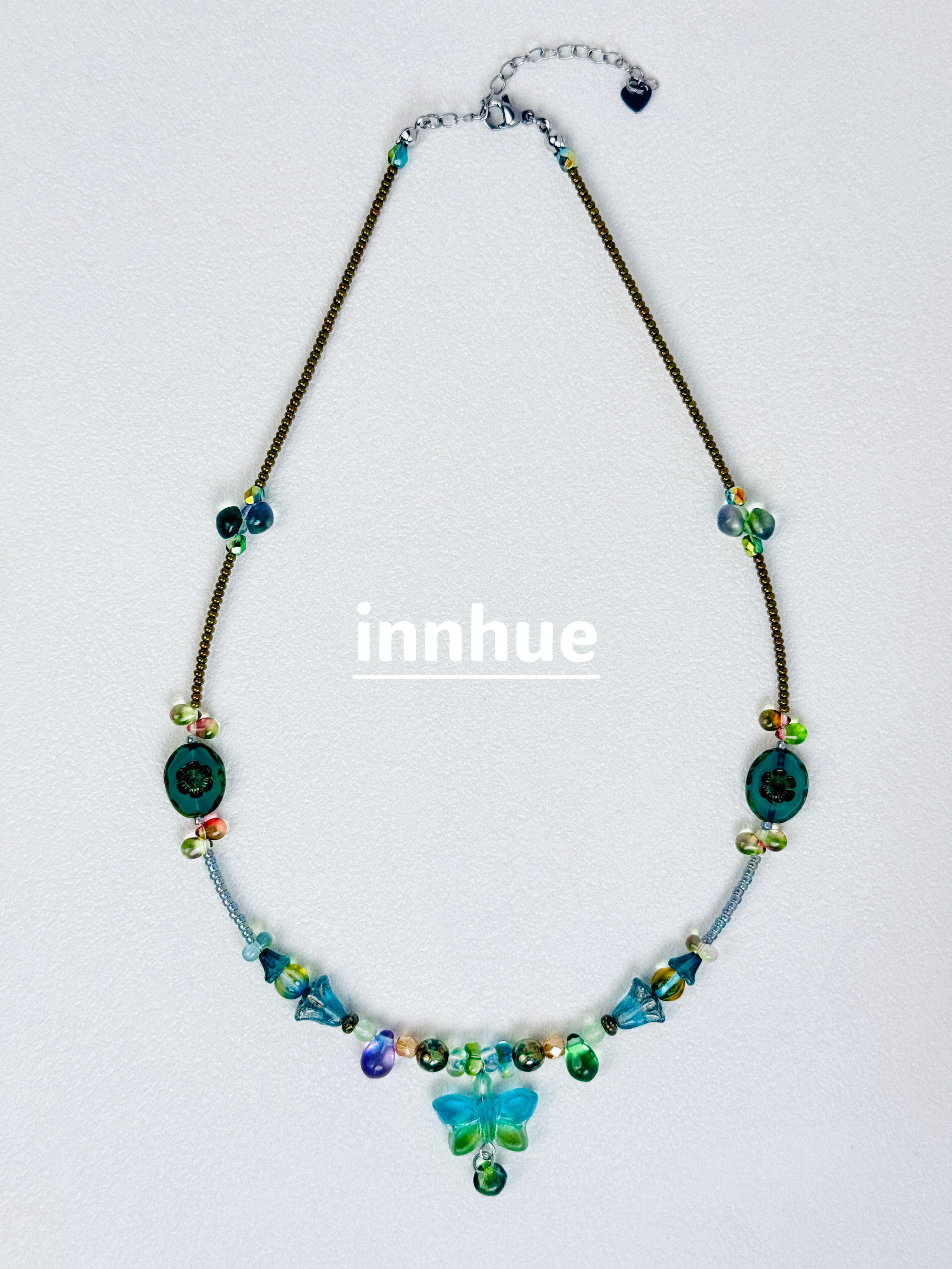 The Bay Nobody Mapped — Teal Butterfly Beaded Necklace